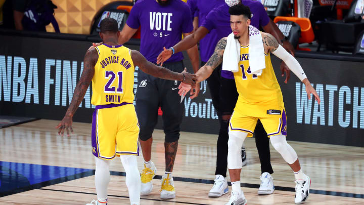 Sep 30, 2020; Orlando, Florida, USA; Los Angeles Lakers guard JR Smith (21) celebrates with guard Danny Green (14) during the fourth quarter against the Miami Heat in game one of the 2020 NBA Finals at AdventHealth Arena. Mandatory Credit: Kim Klement-USA TODAY Sports Sep 30, 2020; Orlando, Florida, USA; Los Angeles Lakers guard JR Smith (21) celebrates with guard Danny Green (14) during the fourth quarter against the Miami Heat in game one of the 2020 NBA Finals at AdventHealth Arena. Mandatory Credit: Kim Klement-USA TODAY Sports
