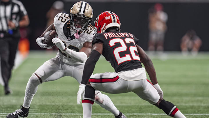 Sep 29, 2024; Atlanta, Georgia, USA; New Orleans Saints wide receiver Rashid Shaheed (22) runs against Atlanta Falcons cornerback Clark Phillips III (22) at Mercedes-Benz Stadium. 