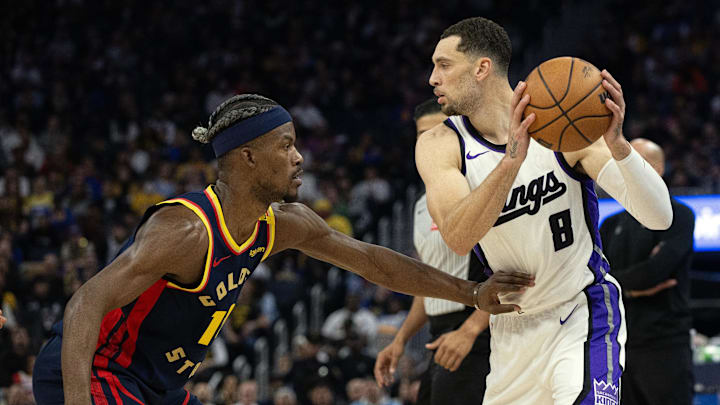 Mar 13, 2025; San Francisco, California, USA; Sacramento Kings guard Zach LaVine (8) looks to pass around Golden State Warriors forward Jimmy Butler III (10) during the second quarter at Chase Center. Mandatory Credit: D. Ross Cameron-Imagn Images Mar 13, 2025; San Francisco, California, USA; Sacramento Kings guard Zach LaVine (8) looks to pass around Golden State Warriors forward Jimmy Butler III (10) during the second quarter at Chase Center. Mandatory Credit: D. Ross Cameron-Imagn Images