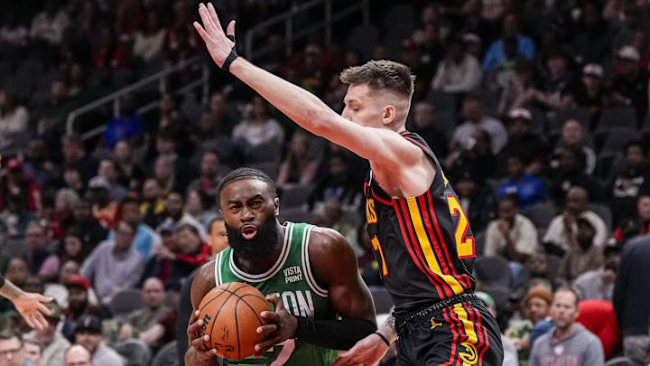 Mar 28, 2024; Atlanta, Georgia, USA; Boston Celtics guard Jaylen Brown (7) works against the defense of Atlanta Hawks guard Vit Krejci (27) during the first half at State Farm Arena. Mandatory Credit: Dale Zanine-Imagn Images Mar 28, 2024; Atlanta, Georgia, USA; Boston Celtics guard Jaylen Brown (7) works against the defense of Atlanta Hawks guard Vit Krejci (27) during the first half at State Farm Arena. Mandatory Credit: Dale Zanine-Imagn Images