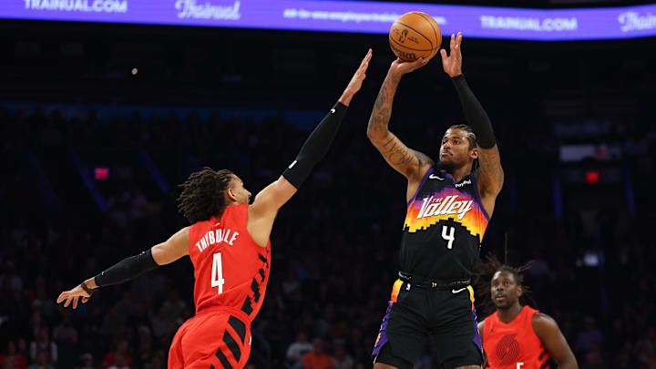 Feb 22, 2026; Phoenix, Arizona, USA; Phoenix Suns forward Jalen Green (right) shoots the ball against Portland Trail Blazers guard Matisse Thybulle in the first half at Mortgage Matchup Center. Mandatory Credit: Mark J. Rebilas-Imagn Images Feb 22, 2026; Phoenix, Arizona, USA; Phoenix Suns forward Jalen Green (right) shoots the ball against Portland Trail Blazers guard Matisse Thybulle in the first half at Mortgage Matchup Center. Mandatory Credit: Mark J. Rebilas-Imagn Images