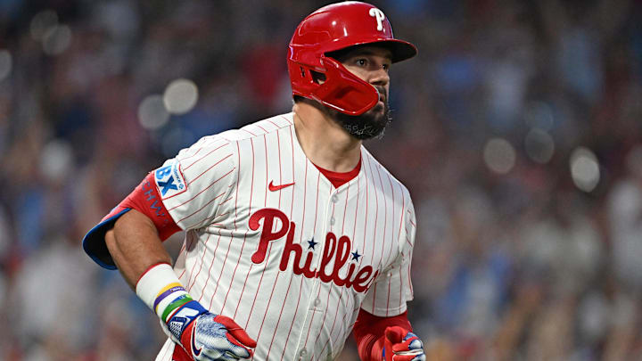 Sep 23, 2025; Philadelphia, Pennsylvania, USA; Philadelphia Phillies outfielder Kyle Schwarber (12) watches his home run during the first inning against the Miami Marlins at Citizens Bank Park.