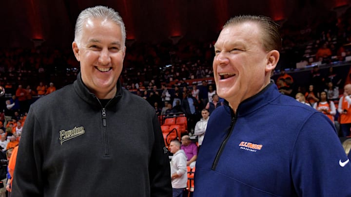 Mar 5, 2024; Champaign, Illinois, USA; Purdue Boilermakers head coach Matt Painter and Illinois Fighting Illini head coach Brad Underwood chat before the start of the game at State Farm Center. Mandatory Credit: Ron Johnson-Imagn Images