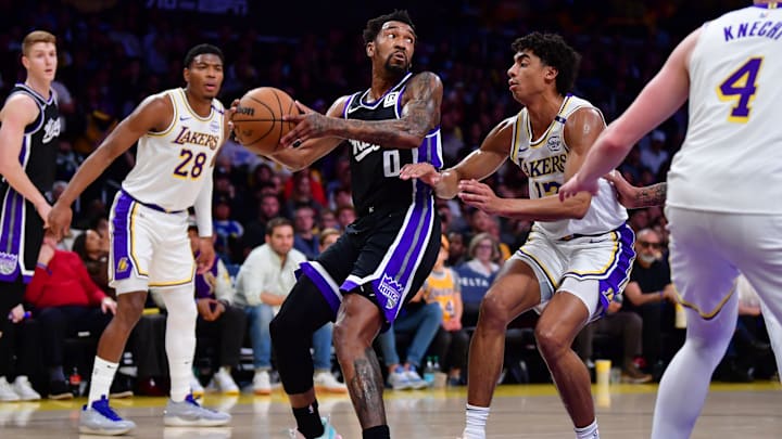 Dec 28, 2024; Los Angeles, California, USA; Sacramento Kings guard Malik Monk (0) controls the ball against Los Angeles Lakers guard Max Christie (12) during the first half at Crypto.com Arena. Mandatory Credit: Gary A. Vasquez-Imagn Images Dec 28, 2024; Los Angeles, California, USA; Sacramento Kings guard Malik Monk (0) controls the ball against Los Angeles Lakers guard Max Christie (12) during the first half at Crypto.com Arena. Mandatory Credit: Gary A. Vasquez-Imagn Images