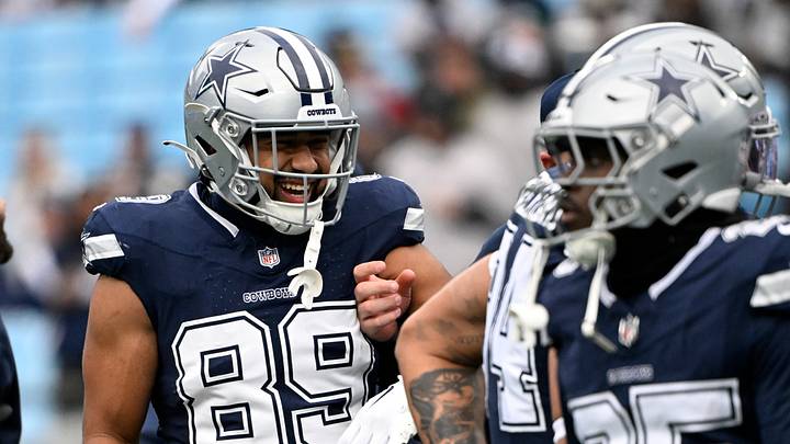 Dallas Cowboys tight end Brevyn Spann-Ford on the field before the game at Bank of America Stadium. Dallas Cowboys tight end Brevyn Spann-Ford on the field before the game at Bank of America Stadium.