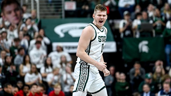 Michigan State's Jaxon Kohler celebrates after making a basket against Rutgers during the second