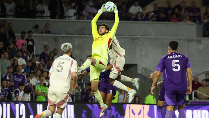 Mar 22, 2025; Orlando, Florida, USA; Orlando City goalkeeper Javier Otero (12) controls the ball against D.C. United in the second half at Inter&Co Stadium. Mandatory Credit: Nathan Ray Seebeck-Imagn Images