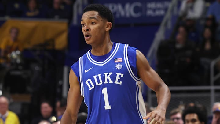 Feb 10, 2026; Pittsburgh, Pennsylvania, USA;  Duke Blue Devils guard Caleb Foster (1) dribbles the ball against the Pittsburgh Panthers during the first half at Petersen Events Center. 