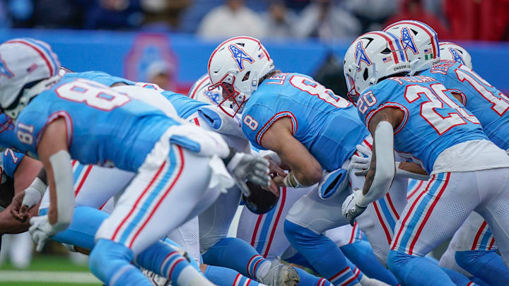 Tennessee Titans quarterback Will Levis (8) fumbles the ball against the Houston Texans during the third quarter at Nissan Stadium in Nashville, Tenn., Sunday, Jan. 5, 2025.