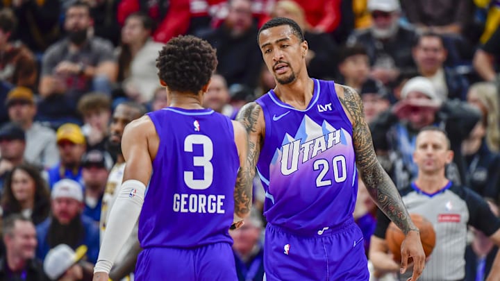 Dec 1, 2024; Salt Lake City, Utah, USA; Utah Jazz forward/center John Collins (20) congratulates guard Keyonte George (3) after a basket against the Los Angeles Lakers during the second half at the Delta Center. Mandatory Credit: Christopher Creveling-Imagn Images