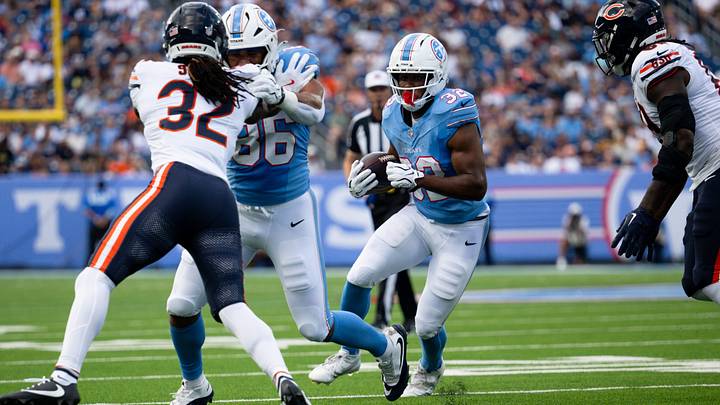 Aug 29, 2026; Nashville, Tennessee, USA; Tennessee Titans running back Nicholas Singleton (32) runs with the ball against the Chicago Bears during the first half at Nissan Stadium. Mandatory Credit: Steve Roberts-Imagn Images Aug 29, 2026; Nashville, Tennessee, USA; Tennessee Titans running back Nicholas Singleton (32) runs with the ball against the Chicago Bears during the first half at Nissan Stadium. Mandatory Credit: Steve Roberts-Imagn Images