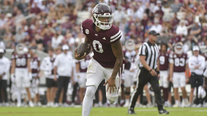 Nov 2, 2024; Starkville, Mississippi, USA;  Mississippi State Bulldogs quarterback Michael Van Buren Jr. (0) runs the ball against the Massachusetts Minutemen during the second quarter at Davis Wade Stadium at Scott Field. Mandatory Credit: Matt Bush-Imagn Images