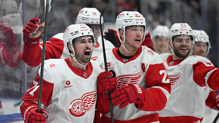 Jan 21, 2026; Toronto, Ontario, CAN; Detroit Red Wings forward Dylan Larkin (71) celebrates with forward Lucas Raymond (23) and teammates after scoring the winning goal in overtime against the Toronto Maple Leafs at Scotiabank Arena. Mandatory Credit: Dan Hamilton-Imagn Images Jan 21, 2026; Toronto, Ontario, CAN; Detroit Red Wings forward Dylan Larkin (71) celebrates with forward Lucas Raymond (23) and teammates after scoring the winning goal in overtime against the Toronto Maple Leafs at Scotiabank Arena. Mandatory Credit: Dan Hamilton-Imagn Images