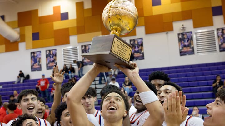 Eastlake boys basketball celebrate their 62-56 win against Odessa High in a playoff game on Tuesday, Feb. 18, 2025, at Eastlake High School in El Paso, Texas.