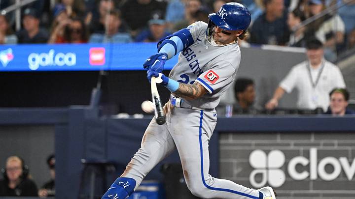 Aug 25, 2026; Toronto, Ontario, CAN; Kansas City Royals catcher Carter Jensen (22) hits a RBI fly out against the Toronto Blue Jays in the sixth inning at Rogers Centre. Mandatory Credit: Dan Hamilton-Imagn Images Aug 25, 2026; Toronto, Ontario, CAN; Kansas City Royals catcher Carter Jensen (22) hits a RBI fly out against the Toronto Blue Jays in the sixth inning at Rogers Centre. Mandatory Credit: Dan Hamilton-Imagn Images