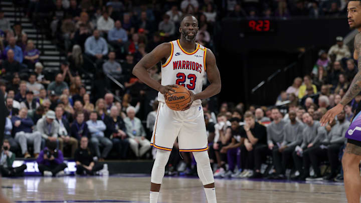Feb 5, 2025; Salt Lake City, Utah, USA;  Golden State Warriors forward Draymond Green (23) controls the ball during the second half against the Utah Jazz at Delta Center. Mandatory Credit: Chris Nicoll-Imagn Images