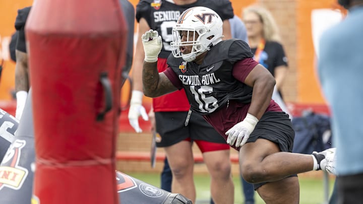 National team defensive lineman Aeneas Peebles of Virginia Tech works through drills during Senior Bowl practice.