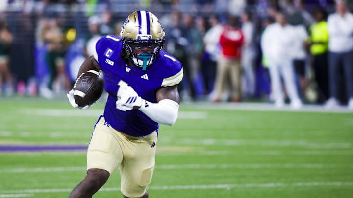 Aug 30, 2025; Seattle, Washington, USA; Washington Huskies running back Jonah Coleman (1) rushes for a touchdown against the Colorado State Rams during the first quarter at Husky Stadium. Mandatory Credit: Joe Nicholson-Imagn Images