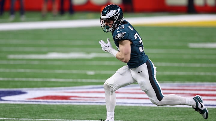Feb 9, 2025; New Orleans, LA, USA; Philadelphia Eagles cornerback Cooper DeJean (33) scores a touchdown after making an interception against the Kansas City Chiefs during the first half of Super Bowl LIX at Caesars Superdome.
