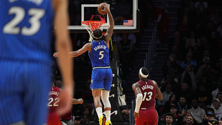 Jan 28, 2026; Miami, Florida, USA; Orlando Magic forward Paolo Banchero (5) dunks as Miami Heat center Bam Adebayo (13) follows on the play during the second half at Kaseya Center. Mandatory Credit: Jim Rassol-Imagn Images Jan 28, 2026; Miami, Florida, USA; Orlando Magic forward Paolo Banchero (5) dunks as Miami Heat center Bam Adebayo (13) follows on the play during the second half at Kaseya Center. Mandatory Credit: Jim Rassol-Imagn Images