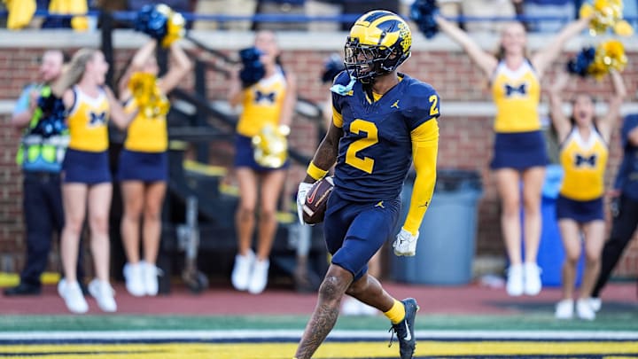 JACKSONVILLE JAGUARS: Michigan defensive back Will Johnson celebrates a touchdown after intercepting USC quarterback Miller Moss during the second half at Michigan Stadium in Ann Arbor on Saturday, Sept. 21, 2024.