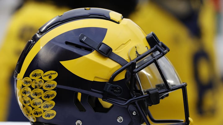 Apr 1, 2023; Ann Arbor, MI, USA; Michigan Wolverines helmet on the sideline during the Spring Game at Michigan Stadium. Mandatory Credit: Rick Osentoski-Imagn Images Apr 1, 2023; Ann Arbor, MI, USA; Michigan Wolverines helmet on the sideline during the Spring Game at Michigan Stadium. Mandatory Credit: Rick Osentoski-Imagn Images