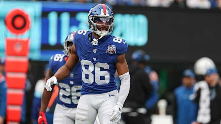 Dec 29, 2024; East Rutherford, New Jersey, USA; New York Giants wide receiver Darius Slayton (86) celebrates after scoring a touchdown reception during the first half against the Indianapolis Colts at MetLife Stadium.  