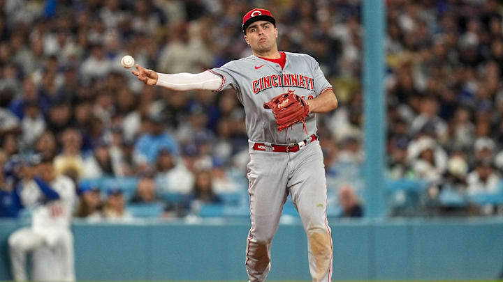 Cincinnati Reds third baseman Sal Stewart (43) plays a ground ball off the bat of Los Angeles Dodgers first baseman Enrique Hernandez (8) in the eighth inning of the MLB National League Wild Card Game 2 between the Los Angeles Dodgers and the Cincinnati Reds at Dodger Stadium in Los Angeles on Wednesday, Oct. 1, 2025. The Reds were eliminated from the postseason with an 8-4 loss to the reining World Series Champions La Dodgers.