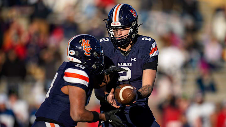 Nashville Christian's Jared Curtis (2) hands off to Terry Ward (10) during the second quarter of the Division II-A championship game against Columbia Academy at Finley Stadium in Chattanooga, Tenn., Thursday, Dec. 5, 2024. Nashville Christian's Jared Curtis (2) hands off to Terry Ward (10) during the second quarter of the Division II-A championship game against Columbia Academy at Finley Stadium in Chattanooga, Tenn., Thursday, Dec. 5, 2024.
