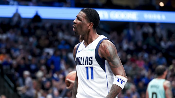 Feb 27, 2025; Dallas, Texas, USA;  Dallas Mavericks guard Kyrie Irving (11) reacts after scoring against the Charlotte Hornets during the second half at American Airlines Center. Mandatory Credit: Kevin Jairaj-Imagn Images