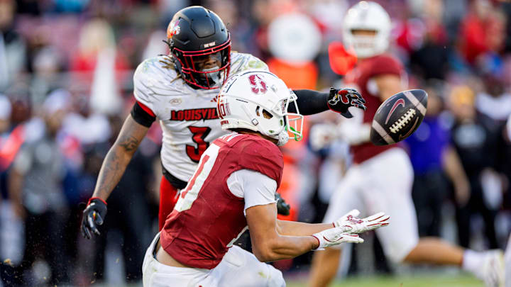 Nov 16, 2024; Stanford, California, USA; Stanford Cardinal wide receiver Emmett Mosley V (10) catches a touchdown pass against the Louisville Cardinals during the fourth quarter at Stanford Stadium. Mandatory Credit: Bob Kupbens-Imagn Images Nov 16, 2024; Stanford, California, USA; Stanford Cardinal wide receiver Emmett Mosley V (10) catches a touchdown pass against the Louisville Cardinals during the fourth quarter at Stanford Stadium. Mandatory Credit: Bob Kupbens-Imagn Images