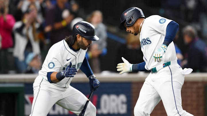 Oct 5, 2025; Seattle, Washington, USA; Seattle Mariners second baseman Jorge Polanco (7) celebrates his solo home run with third baseman Eugenio Suarez (28) in the sixth inning against the Detroit Tigers during game two of the ALDS round for the 2025 MLB playoffs at T-Mobile Park. Mandatory Credit: Steven Bisig-Imagn Images Oct 5, 2025; Seattle, Washington, USA; Seattle Mariners second baseman Jorge Polanco (7) celebrates his solo home run with third baseman Eugenio Suarez (28) in the sixth inning against the Detroit Tigers during game two of the ALDS round for the 2025 MLB playoffs at T-Mobile Park. Mandatory Credit: Steven Bisig-Imagn Images