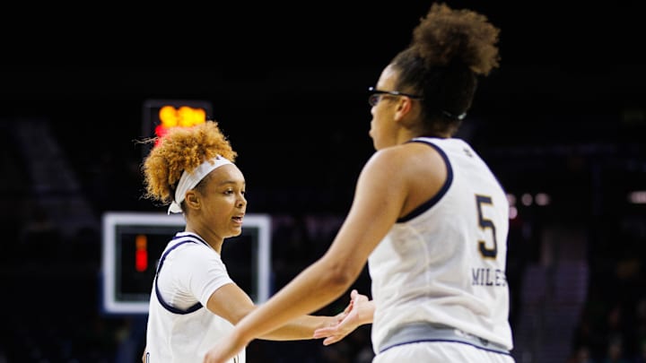 Notre Dame guard Hannah Hidalgo, left, and guard Olivia Miles (5) celebrate a goal scored during an exhibition game against Davenport on Wednesday, Oct. 30, 2024, at Purcell Pavilion in South Bend. Notre Dame won 101-41. Notre Dame guard Hannah Hidalgo, left, and guard Olivia Miles (5) celebrate a goal scored during an exhibition game against Davenport on Wednesday, Oct. 30, 2024, at Purcell Pavilion in South Bend. Notre Dame won 101-41.