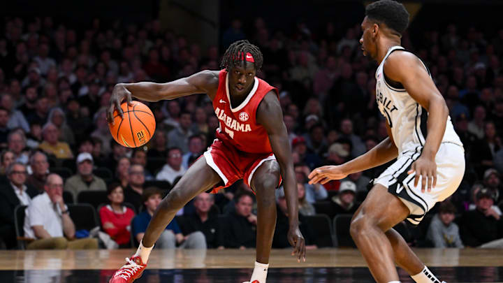 Jan 7, 2026; Nashville, Tennessee, USA;  Alabama Crimson Tide forward Taylor Bol Bowen (7) drives baseline against the Vanderbilt Commodores during the first half at Memorial Gymnasium. Mandatory Credit: Steve Roberts-Imagn Images