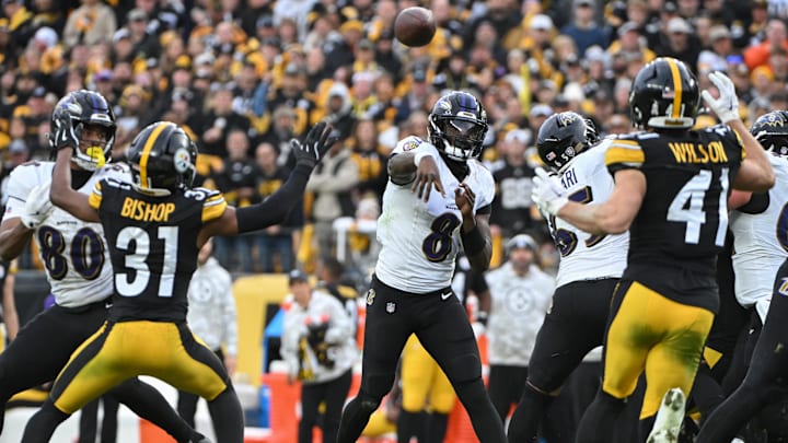 Nov 17, 2024; Pittsburgh, Pennsylvania, USA; Baltimore Ravens quarterback Lamar Jackson (8) throws a touchdown pass to wide receiver Zay Flowers (4) as Pittsburgh Steelers cornerback Beanie Bishop Jr. (31) looks on during the fourth quarter at Acrisure Stadium. Mandatory Credit: Barry Reeger-Imagn Images Nov 17, 2024; Pittsburgh, Pennsylvania, USA; Baltimore Ravens quarterback Lamar Jackson (8) throws a touchdown pass to wide receiver Zay Flowers (4) as Pittsburgh Steelers cornerback Beanie Bishop Jr. (31) looks on during the fourth quarter at Acrisure Stadium. Mandatory Credit: Barry Reeger-Imagn Images