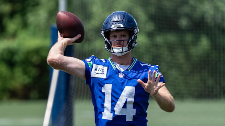 Jun 11, 2025; Renton, WA, USA; Seattle Seahawks quarterback Sam Darnold (14) passes the ball during mini-camp at Virginia Mason Athletic Center. Mandatory Credit: Stephen Brashear-Imagn Images