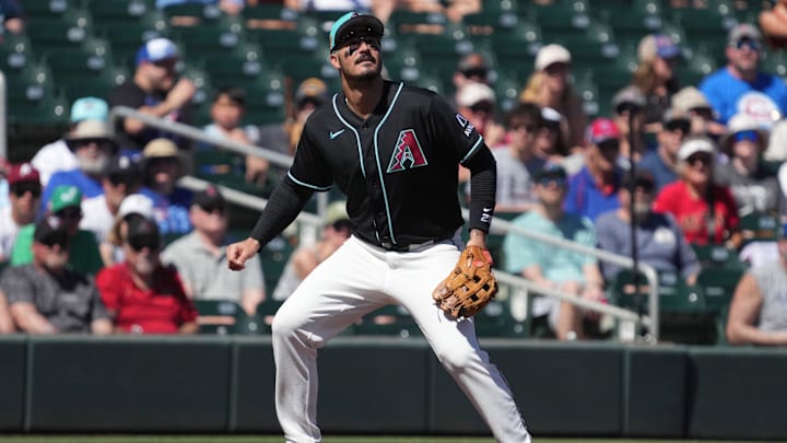Mar 18, 2026; Salt River Pima-Maricopa, Arizona, USA; Arizona Diamondbacks third baseman Nolan Arenado (28) looks for the ball against the Chicago Cubs in the second inning at Salt River Fields at Talking Stick. Mandatory Credit: Rick Scuteri-Imagn Images