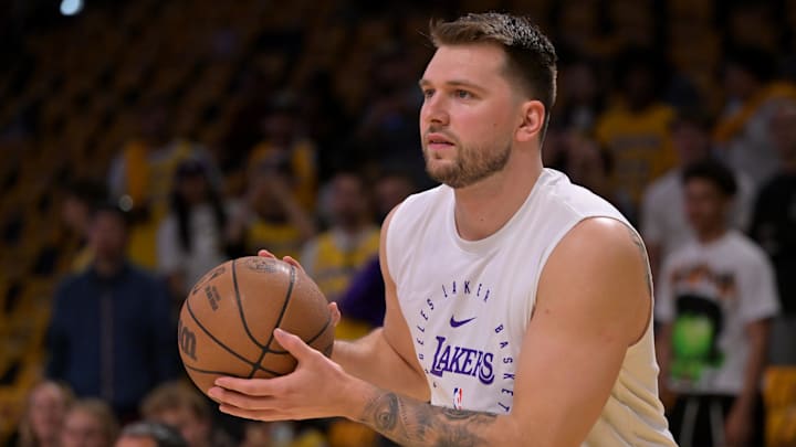 Apr 19, 2025; Los Angeles, California, USA;  Los Angeles Lakers guard Luka Doncic (77) warms up prior to the game against the Minnesota Timberwolves at Crypto.com Arena. Mandatory Credit: Jayne Kamin-Oncea-Imagn Images