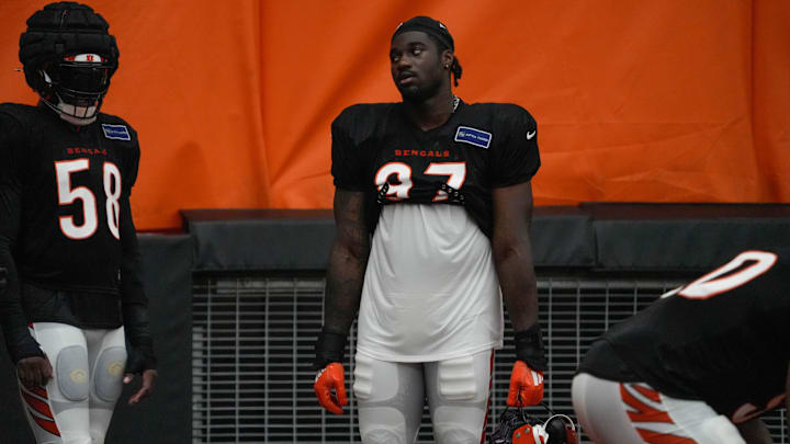 Bengals continue training camp Monday July 28, 2025. Players and coaches ran drills outside on the practice lawn until rain moved the camp to the Bengals' inside practice facility. Bengals Shemar Stewart (97) at camp.