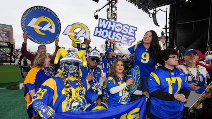 Apr 24, 2025; Green Bay, WI, USA; Los Angeles Rams fans cheer before the first round of the 2025 NFL Draft at Lambeau Field. Mandatory Credit: Kirby Lee-Imagn Images Apr 24, 2025; Green Bay, WI, USA; Los Angeles Rams fans cheer before the first round of the 2025 NFL Draft at Lambeau Field. Mandatory Credit: Kirby Lee-Imagn Images