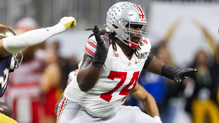 Jan 20, 2025; Atlanta, GA, USA; Ohio State Buckeyes offensive lineman Donovan Jackson (74) against the Notre Dame Fighting Irish during the CFP National Championship college football game at Mercedes-Benz Stadium. Mandatory Credit: Mark J. Rebilas-Imagn Images Jan 20, 2025; Atlanta, GA, USA; Ohio State Buckeyes offensive lineman Donovan Jackson (74) against the Notre Dame Fighting Irish during the CFP National Championship college football game at Mercedes-Benz Stadium. Mandatory Credit: Mark J. Rebilas-Imagn Images