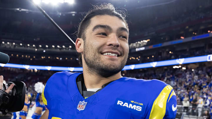 Jan 13, 2025; Glendale, AZ, USA; Los Angeles Rams wide receiver Puka Nacua (17) celebrates after defeating the Minnesota Vikings during an NFC wild card game at State Farm Stadium. Mandatory Credit: Mark J. Rebilas-Imagn Images