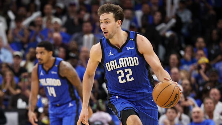 Apr 15, 2025; Orlando, Florida, USA; Orlando Magic forward Franz Wagner (22) controls the ball against the Atlanta Hawks in the third quarter at Kia Center. Mandatory Credit: Nathan Ray Seebeck-Imagn Images