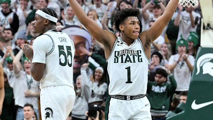 Jan 19, 2025; East Lansing, Michigan, USA;  Michigan State Spartans guard Jeremy Fears Jr. (1) urges the crowd to get loud during the second half against the Illinois Fighting Illini at Jack Breslin Student Events Center. Mandatory Credit: Dale Young-Imagn Images