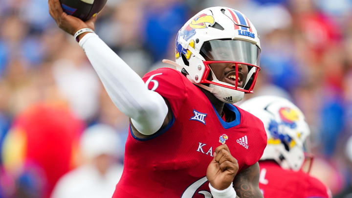 Sep 23, 2023; Lawrence, Kansas, USA; Kansas Jayhawks quarterback Jalon Daniels (6) throws a pass during the first half against the Brigham Young Cougars at David Booth Kansas Memorial Stadium. Mandatory Credit: Jay Biggerstaff-USA TODAY Sports Sep 23, 2023; Lawrence, Kansas, USA; Kansas Jayhawks quarterback Jalon Daniels (6) throws a pass during the first half against the Brigham Young Cougars at David Booth Kansas Memorial Stadium. Mandatory Credit: Jay Biggerstaff-USA TODAY Sports