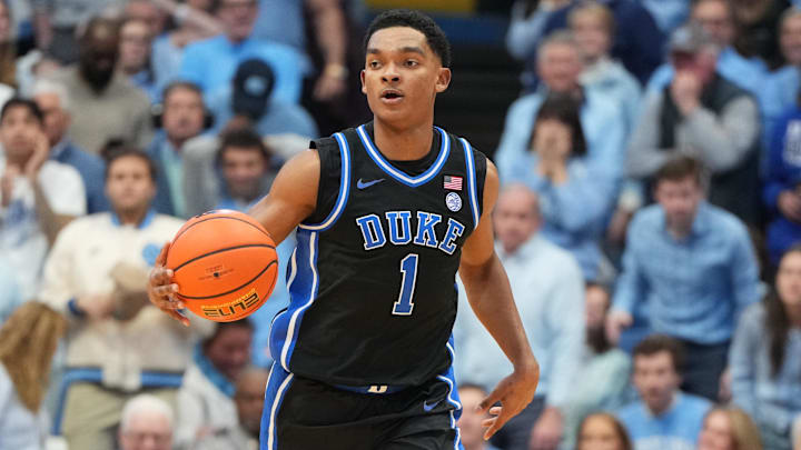 Feb 7, 2026; Chapel Hill, North Carolina, USA;  Duke Blue Devils guard Caleb Foster (1) with the ball in the first half at Dean E. Smith Center.