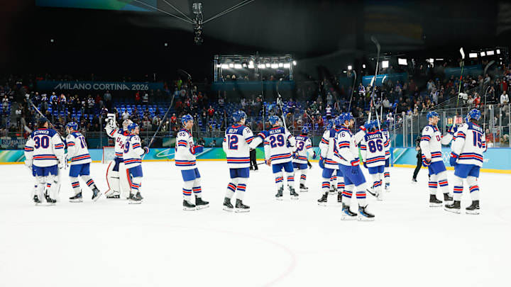 Feb 20, 2026; Milan, Italy; The United States celebrate on the ice after the game against Slovakia in a men's ice hockey semifinal during the Milano Cortina 2026 Olympic Winter Games at Milano Santagiulia Ice Hockey Arena. Mandatory Credit: Geoff Burke-Imagn Images