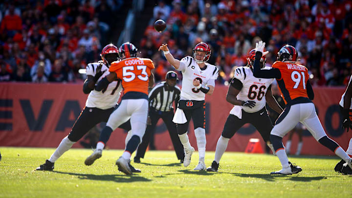 Cincinnati Bengals quarterback Joe Burrow (9) throws a pass in the first half of the NFL football game between the Bengals and the Denver Broncos on Sunday, Dec. 19, 2021, at Empower Field in Denver.

Cincinnati Bengals At Denver Broncos 368