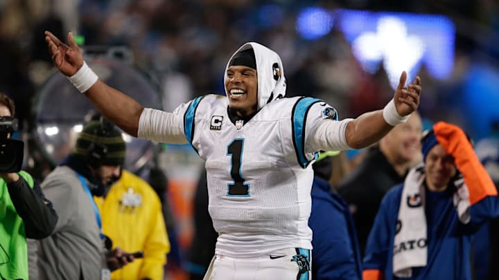 Jan 24, 2016; Charlotte, NC, USA; Carolina Panthers quarterback Cam Newton (1) celebrates on the sidelines in the fourth quarter against the Arizona Cardinals during the NFC Championship football game held at Bank of America Stadium. Mandatory Credit: Jeremy Brevard-Imagn Images