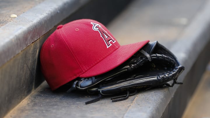 An Angels cap and glove before the game against the Texas Rangers at Globe Life Park in Arlington. 